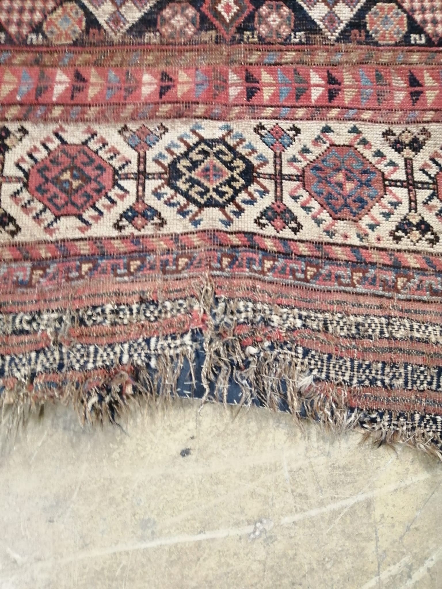 An antique Khamseh rug, 290 x 136cm